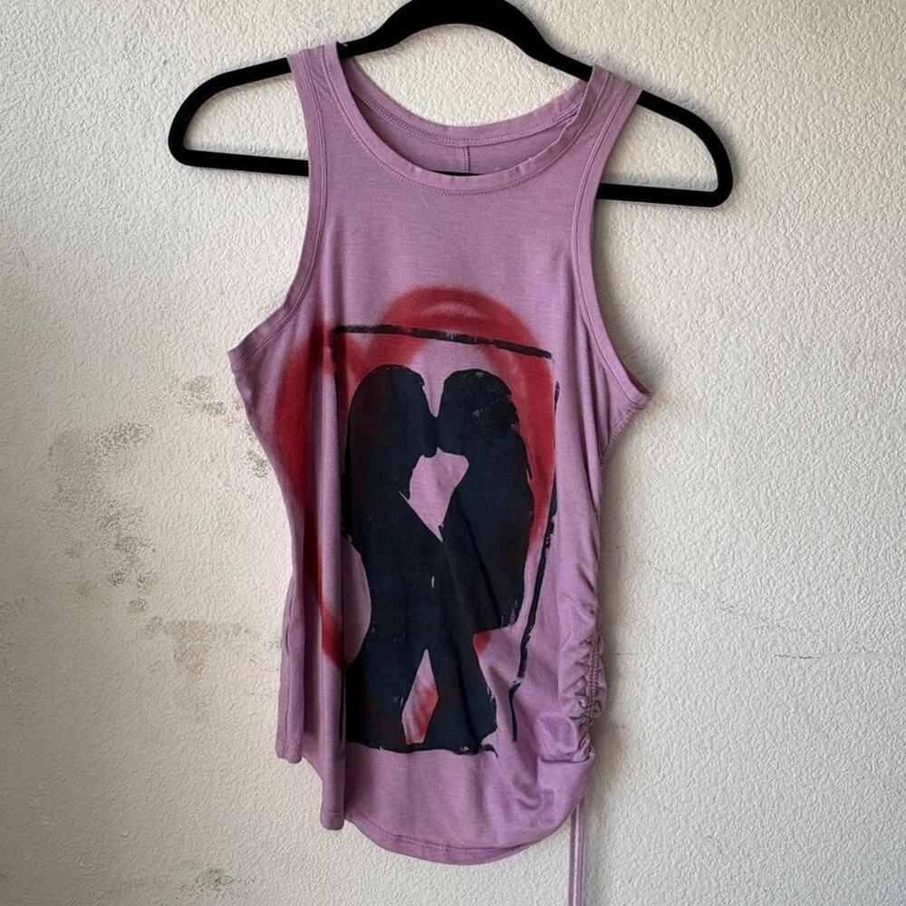 Womans pink tank top featuring 'womanly love'